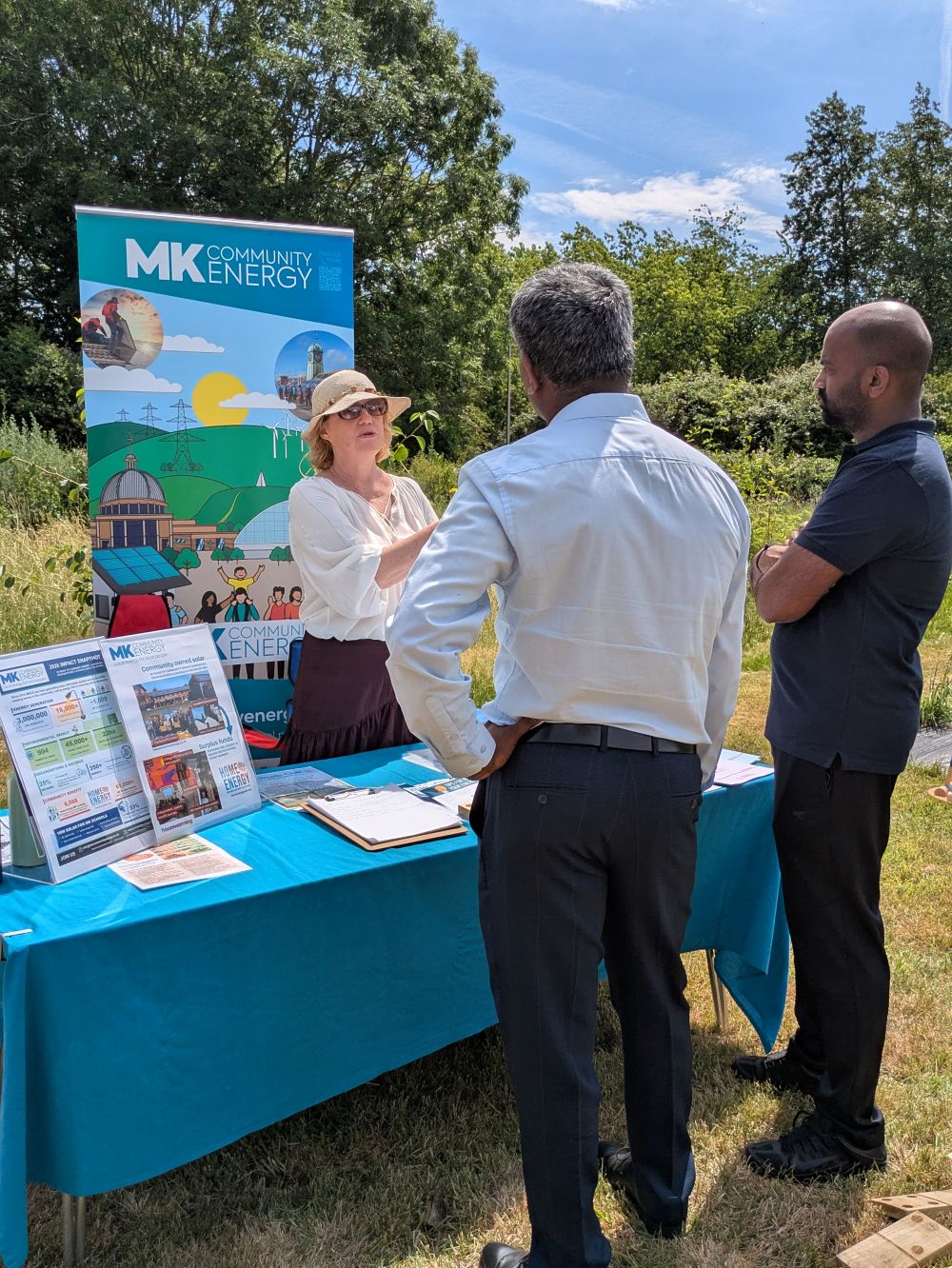 GGT Community Picnic stall - Jane talking with Tamil Academy